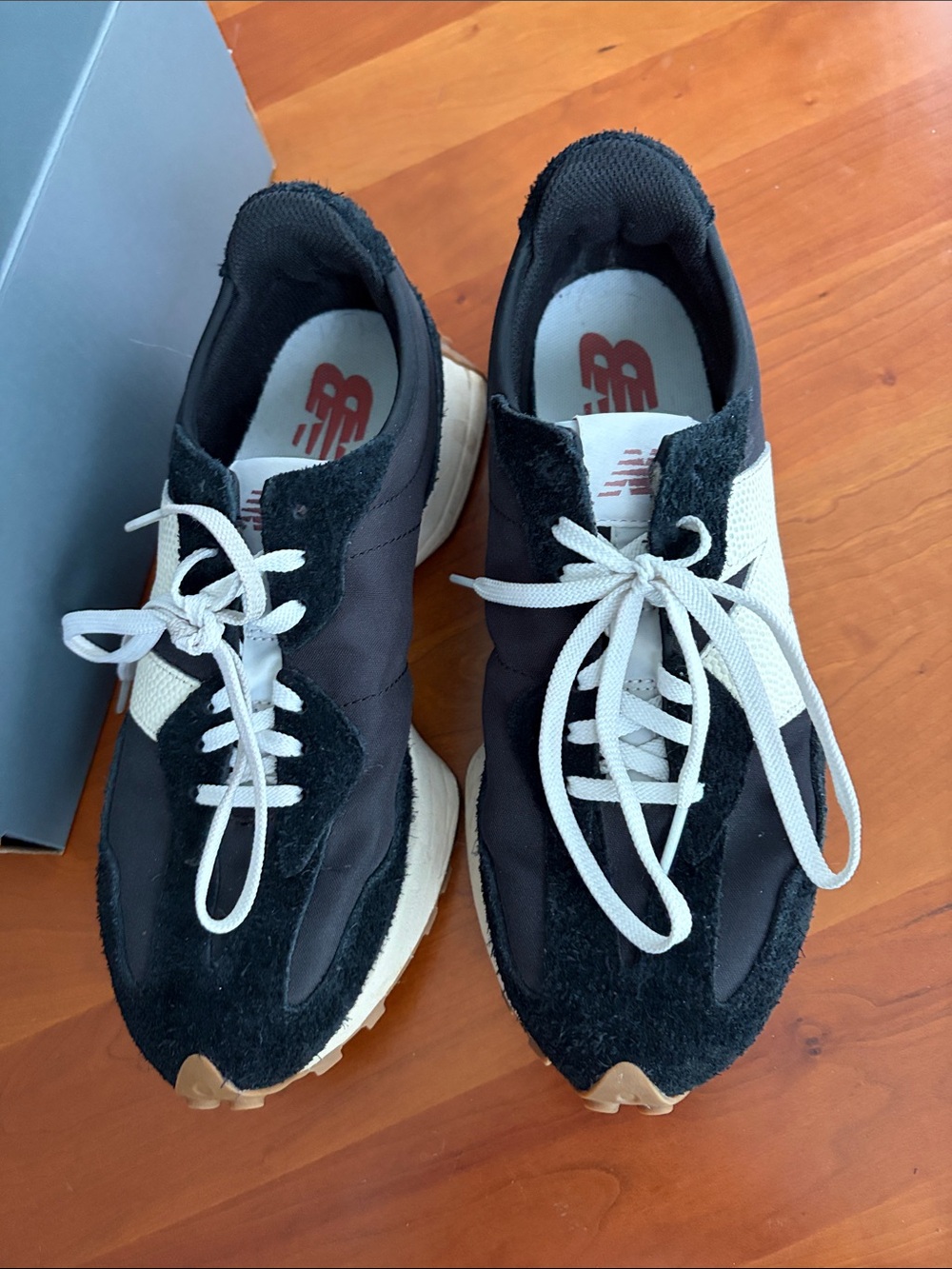 New Balance women’s black and white retro-inspired athletic sneakers